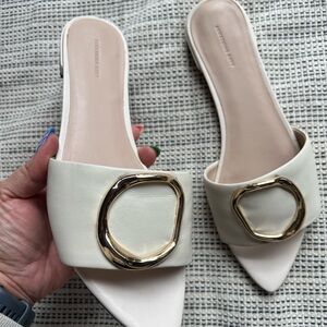 White Slide Sandals with Gold Accent and Pointed Toe